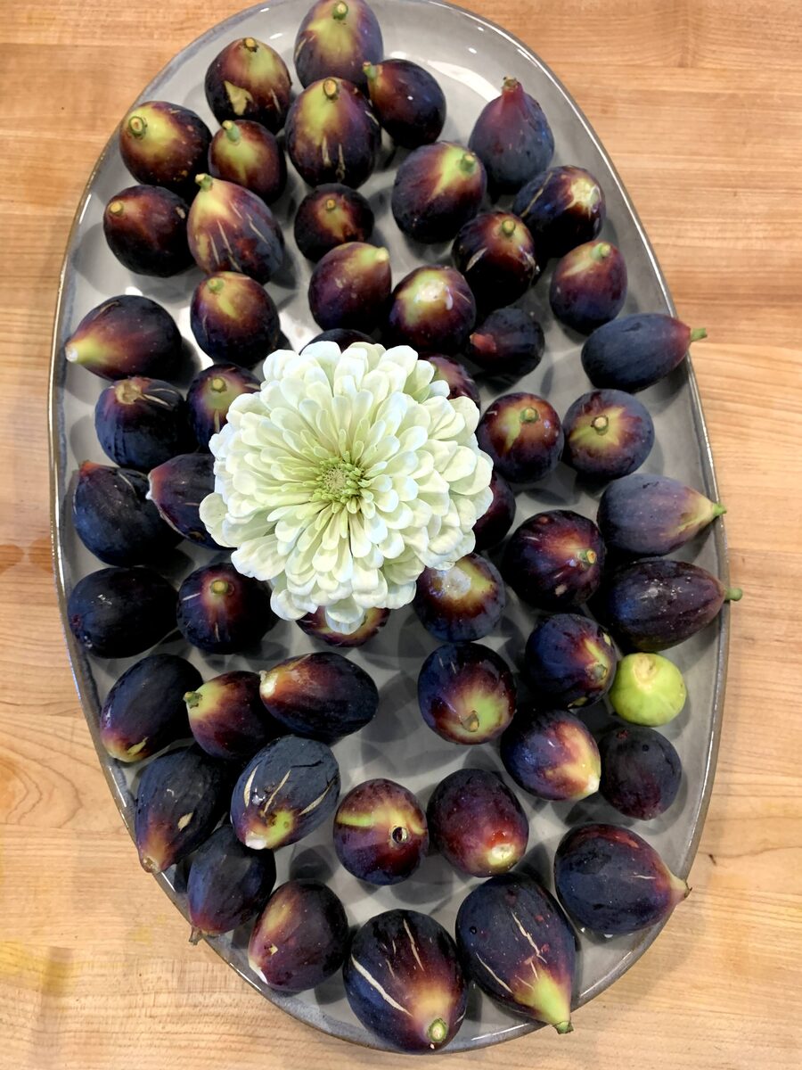 A platter of halved fresh figs